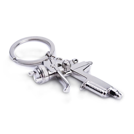 Llavero Pistola de Agua para Hombre - Juguete Miniatura Portátil - Image 6