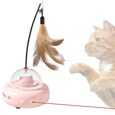 Electric interactive cat toy with a beige base, clear dome, and a cute cat head inside. Features a feather teaser wand with a bell.