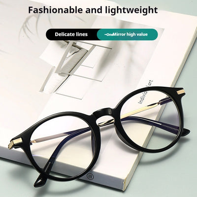 Dark purple round-frame anti-blue light reading glasses with silver-colored temples on a white background.