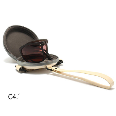 Light brown foldable women's sunglasses with round frames and brown polarized lenses on a white background. - Image 10