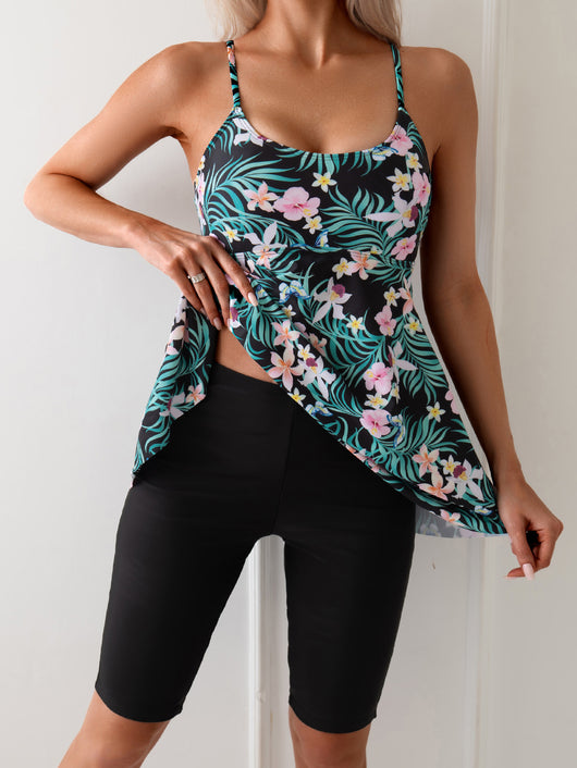Women's navy blue two-piece swimsuit with white floral tankini top and matching solid swim shorts. - Image 17