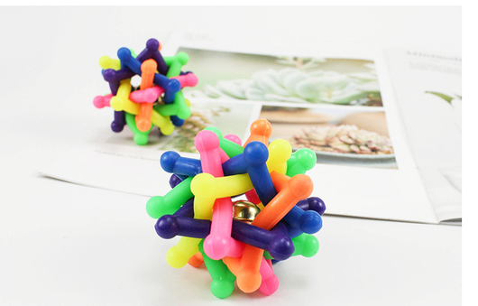 Colorful rainbow pet chew toy ball made of soft rubber with an interlocking design and an internal bell. - Image 7
