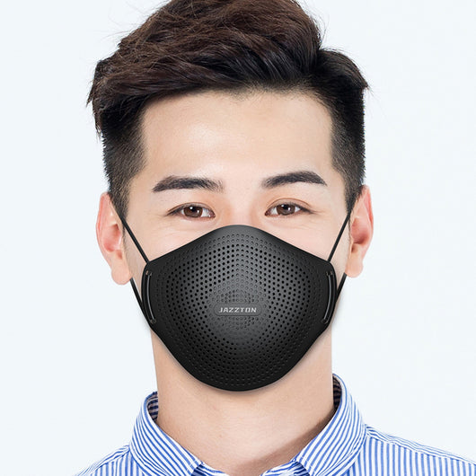 Light blue dust mask with perforated design and central breathing valve, worn by a woman. - Image 13