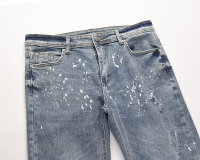 Jeans Azul Claro con Efecto Salpicado y Rotos Desgastados - Image 3