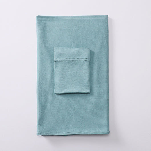 Black minimalist modal bottom hat integrated scarf, folded neatly on a white background. - Image 35