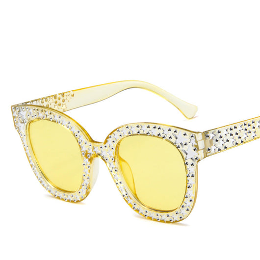 Black cat-eye sunglasses for ladies, featuring silver star embellishments on the frames and temples. - Image 8