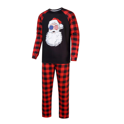 Christmas pajama set with a black long-sleeve top featuring a Santa head in American flag sunglasses and red and black buffalo plaid pants. - Image 5