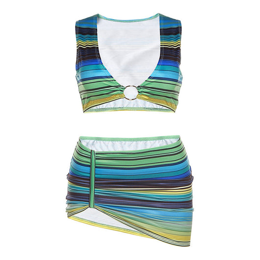 Women's green, blue, and yellow striped two-piece set with a V-neck crop top and an asymmetrical mini skirt. - Image 6
