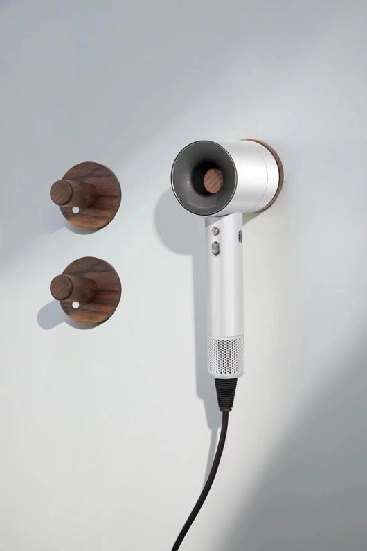 Modern matte blue handheld hair dryer with gold nozzle accent and perforated air intake, featuring control buttons. - Image 12