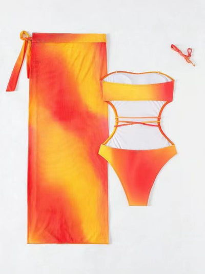 Blue ombre one-piece swimsuit with side cutouts and a matching blue ombre sarong with tie closure. - Image 43