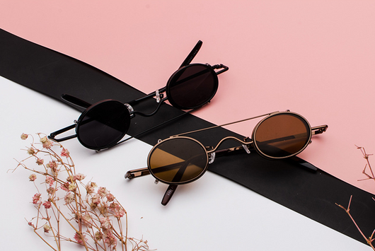 Retro round sunglasses with vibrant red lenses and a black metal frame, featuring a unique flip-up design. - Image 14