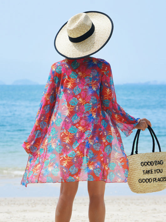 Multicolor tropical print three-piece swimsuit set with high-waisted bikini and sheer mesh cover-up on a beach. - Image 20