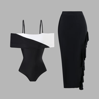 Black one-piece swimsuit with a deep V-neckline and white horizontal stitching detail across the plunge. - Image 36