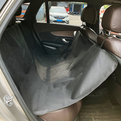 Pink car pet mat with white paw print and bone patterns, featuring black straps for securing to a rear seat. - Image 15