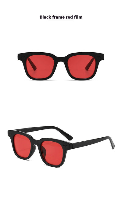 Black frame square sunglasses with light blue lenses, angled on a white background. - Image 27