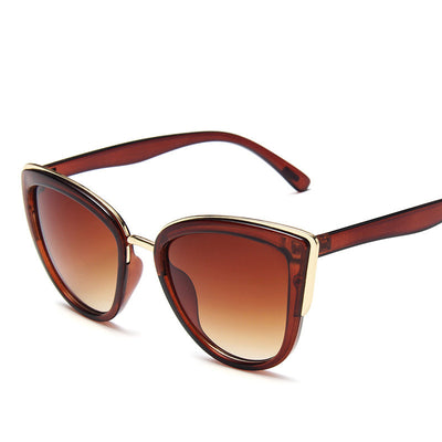 Ladies retro cat eye sunglasses with a tortoiseshell frame, gold accents, and brown gradient lenses. - Image 10