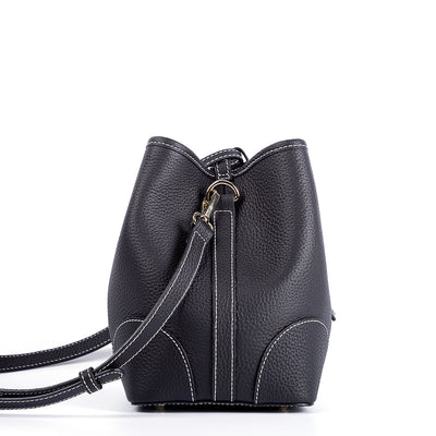Bolso Cubo Retro de Cuero Genuino con Patrón Grabado y Cordón Ajustable - Image 17