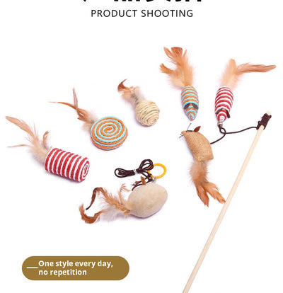 7-piece cat toy gift set with mouse, feather wands, and string-wrapped toys in a brown cardboard box. - Image 10