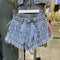 Shorts de Mezclilla con Detalles de Strass y Plumas de Avestruz