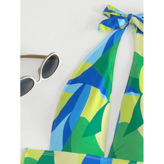 Sexy lace-up backless beach swimwear skirt set with a vibrant blue, green, and yellow geometric print. - Image 4