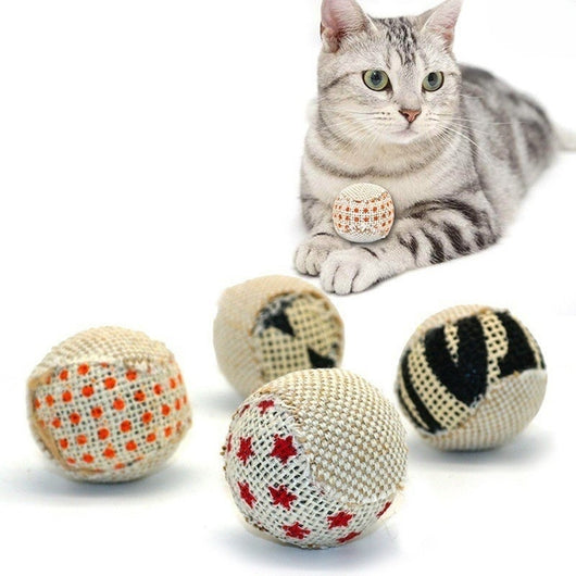 Four interactive cat toy chewing balls with woven textures and various patterns including polka dots, stripes, and stars. - Image 4