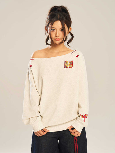 Blusa Suelta de Manga Larga con Bordado y Hombro Caído - Image 8