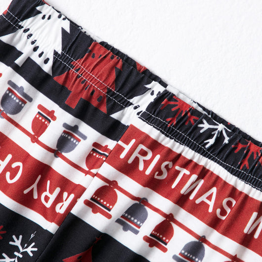 Family of four wearing matching Christmas pajamas with 'MERRY Christmas' text, leopard print, and plaid trees. - Image 13