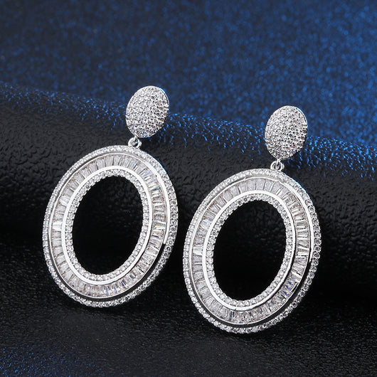 Aretes Redondos de Moda con Piedras de Cristal Incrustadas - Image 2