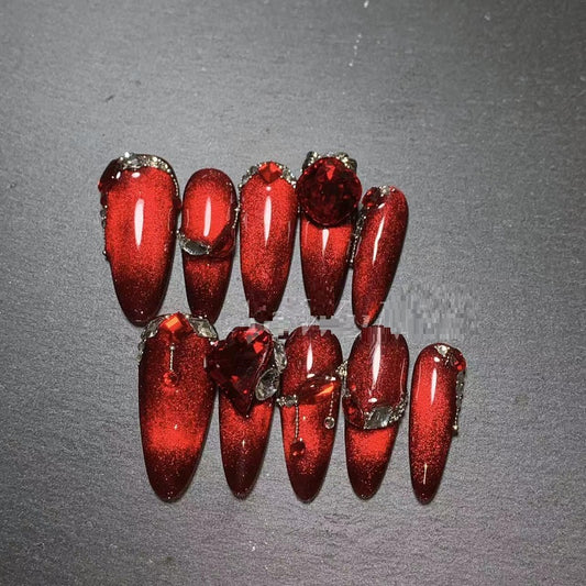 Uña Artesanal de Lujo Ojo de Gato Rojo con Diamantes para Año Nuevo - Image 2