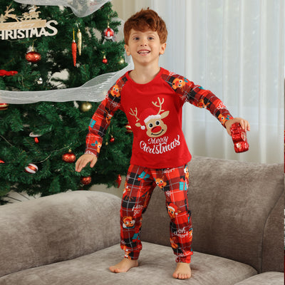 Family matching red Christmas pajamas with a cartoon reindeer and "Merry Christmas" text on a plaid background. - Image 15