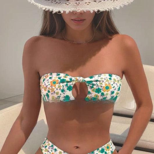 White floral print bandeau bikini with pink and blue flowers, featuring a front knot top and high-cut bottom. - Image 3
