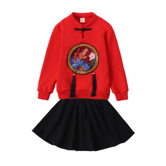 Family of four in matching red long-sleeve tops with a rabbit graphic, celebrating the Year of the Rabbit. - Image 2