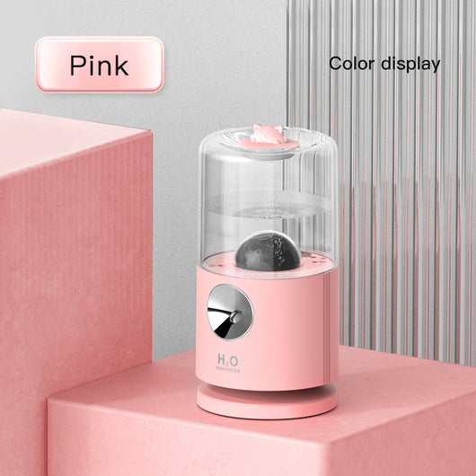 Light blue smart rotary projection humidifier with a clear water tank and a cute cat-shaped top. - Image 7
