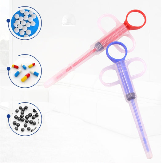 Pet feeding kit with a green syringe-style feeder and two clear teats, packaged for dogs and cats. - Image 10