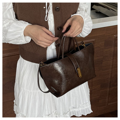 Bolso Bucket de Cuero Encerado Elegante y Portátil - Image 54