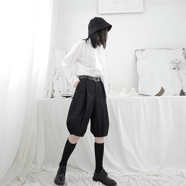Shorts Oscuros con Puños Elásticos