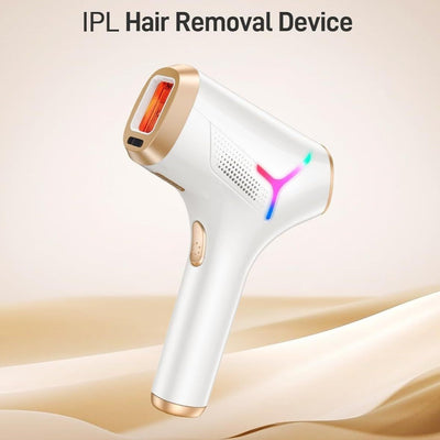White and gold IPL hair removal device with safety glasses and razor, shown with its "Hair Removal" packaging.