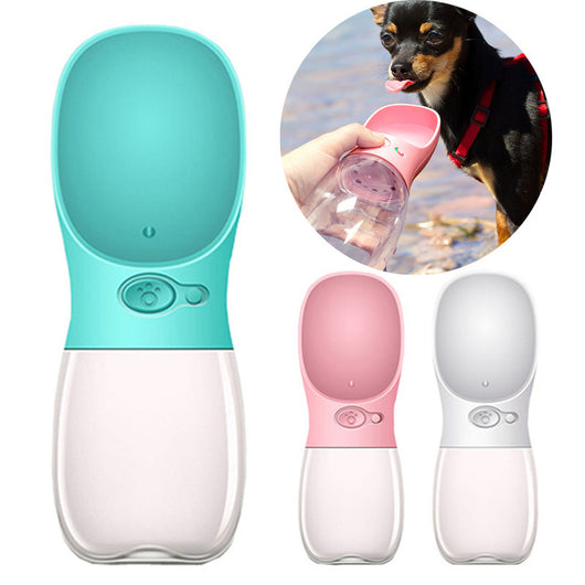 White portable pet water bottle with a clear reservoir and built-in drinking bowl, shown in a bag. - Image 23