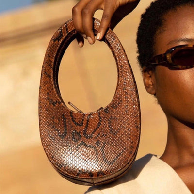 Bolso de Mano Tridimensional con Forma de Huevo - Image 9