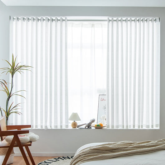 White translucent thickened sunscreen curtain made of hemp yarn with grommet top, hanging in a modern window.