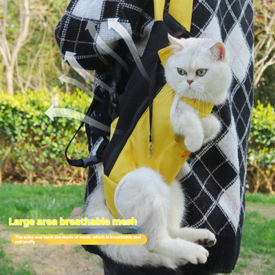 Denim blue pet carrier backpack with open head and leg holes, featuring breathable mesh and a front pocket.
