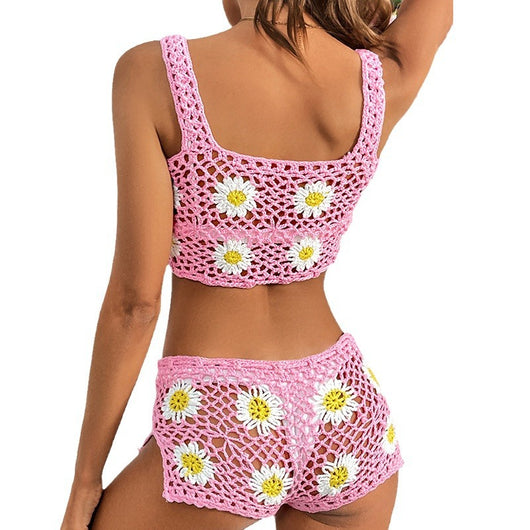 Pink crochet two-piece swimsuit with white and yellow daisy patterns, featuring a crop top and matching shorts. - Image 5