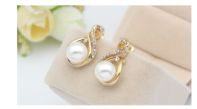 Gold-tone necklace and matching earrings set with white faux pearls and clear rhinestones, ideal for bridal or dinner wear. - Image 11