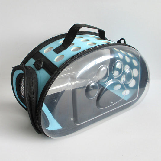Gray and black pet carrier with a clear bubble window featuring paw prints and a mesh side for ventilation.