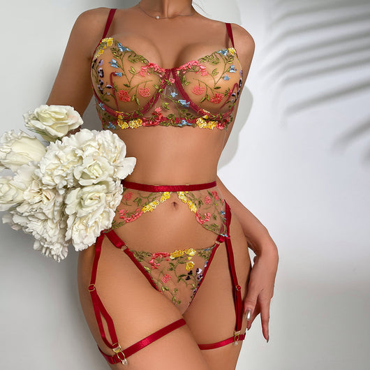 Yellow sheer floral embroidered lingerie set with a bra, thong, and two leg rings, laid flat. - Image 4