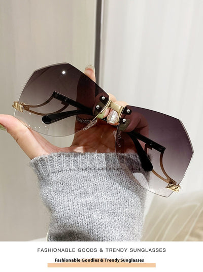 Rimless sunglasses with gradient pink lenses and gold-tone hollow temples, featuring a unique quadrilateral shape. - Image 18