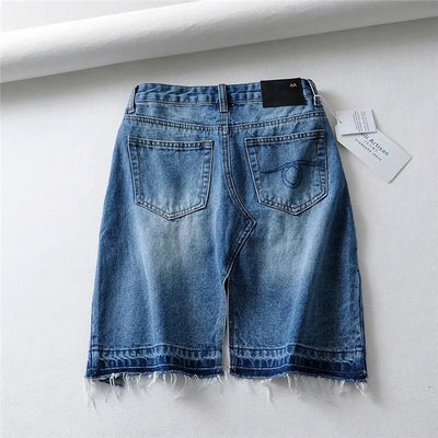Falda Denim Irregular con Borde Crudo - Image 13