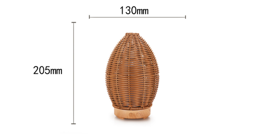 Hollow rattan aroma diffuser with an egg-shaped woven brown exterior and a light wood-grain base. - Image 7