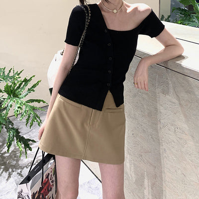 Blusa Blanca Asimétrica con Corte Irregular - Image 8