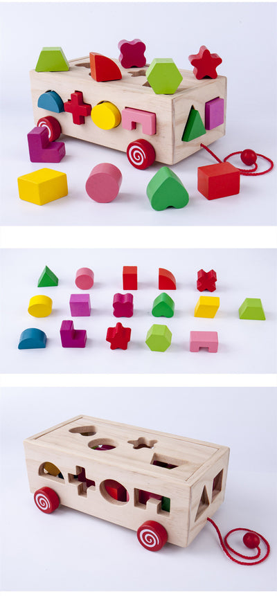 Happy baby playing with a wooden shape matching building block toy, featuring a natural wood box and colorful geometric shapes. - Image 6